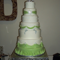 Kayla's Wedding Cake Done for a friend. Largest one I've done. Bottom 3 tiers were dummy cakes. All covered in MMF with MMF accents. TFL!