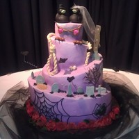 Halloween Themed Wedding Cake All buttercream with fondant/gumpaste accents. The eyes light up.