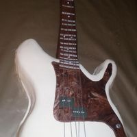 Bass Guitar Entirely edible except the strings. The whole thing was 40" long.