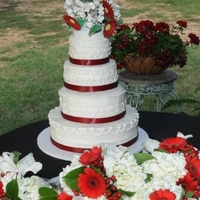 1321417201.jpg Bottom up - WASC, Carrot Cake, Strawberry, WASC with buttercream fositing and sugar flowers