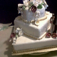 Squares 3 tiered wedding cake.