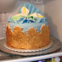 Gold Cale This was a CHocolate cake.Covered with Fondant. used Gold Lutre dust.