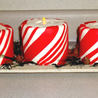 Peppermint Striped Christmas Candles These Cakes were made for a family Christmas Dinner. Everyone assumed these were just decorations and were looking for the cake...LOL!...