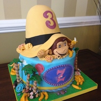 Curious George Birthday Cake Made this for a neighbor's grandaughter's 3rd Birthday (thus, the flowers). Cake: 6" and 10" tiers of marble cake,...