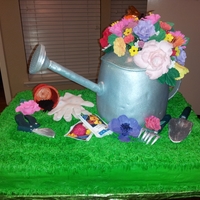 Watering Can Cake Watering can cake made for the Central EMS Auction - Watering can made of rice crispy treat covered with candy clay and fondant. Sugar...