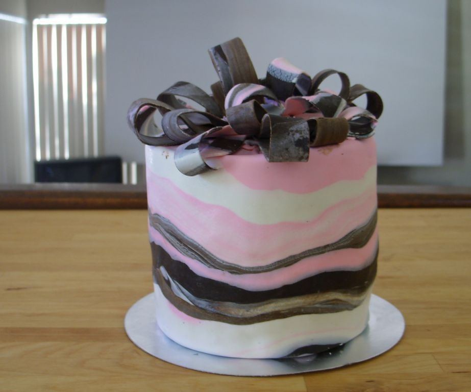 Marble For Marble's Sake, With A Bow Attempt I just LOVE marbling! Saw a post a couple of days ago on the best way to cover in fondant a tall skinny cake (as in a Dr. Seuss hat) so I...