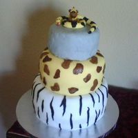 Jungle Theme Zebra print chocolate cake w/ chocolate mousse, Giraffe print marble cake w/ banana cream mousse, wrinkled elephant skin lemon cake w/...
