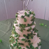 Green Leaves Wedding Cake Almond white cake with IMBC and Fondarific ivory fondant, gumpaste rose leaves