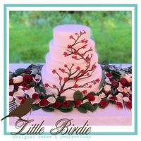 Red Cherry Blossom Cake I had a bit of trouble with the deep red fondant for the flowers, and ended up using a large star tip to imprint "veins" on them...