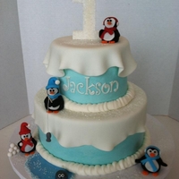 Winter Wonderland Winter Wonderland cake for an adorable customer turning one. The penguins were hand scupted from fondant/tylose. Thank you to many Cake...