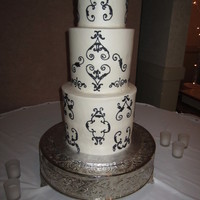 Extra Tall Extra tall tiers, all buttercream. Bottom, 4-10" round, middle, 4-8" round and top is 2-6" rounds. Delivery was 1 hour and...