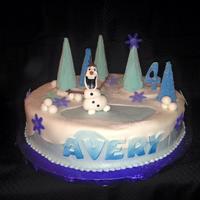 It May Be Below Freezing But Olaf Melts Your Heart! Buttercream base with fondant overlay. Sugar cone trees covered in icing and sanding sugar. So much fun to make!