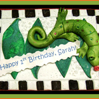 All Edible Decoration Fondant Rice Paper Edible Ink On Foamcore Base With Ribbon On Edge All edible decoration (fondant, rice paper, edible ink) on foamcore base with ribbon on edge.