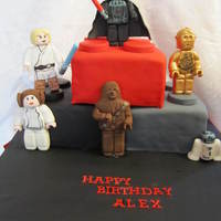 Lego Star Wars Birthday Cake This cake was for my son's 6th birthday party and included fondant figures of Darth Vader, C-3P0, R2-D2, Chewbacca, Leia, and Luke.