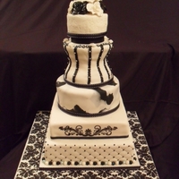 White And Black Vanilla,lemon and Oreo cookie tiers,thanks to ninettaduci, sonyanolan, ptanyer , Ili that helped me achieve the concave shape.