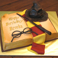 Harry Potter Cake For a harry potter fan. Book sculpted from a 9x13 sheet cake. Sorting hat is cake. Yellow cake with canned choc frosting (as requested by...