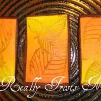 Color Fade Leaf Cookies Chocolate roll out cookies with color fading fondant and leaf design.