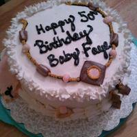 Jewlery Small round in buttercream....fondant details