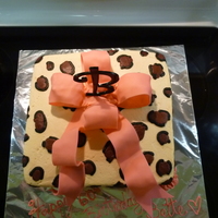Leopard & Pink Cake is covered in BC and spots are BC too. The bow is fondant, roses BC and the "B" store bought. Loved making this cake!!!