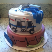 Paramedic Graduation Cake Gumpaste decorations on fondant covered cake. Thanks for looking!