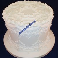 Tradional Style Royal Iced Cake 1910 This 9 inch royal iced cake (6 inch depth) was piped in the style of S.P. Borella - booked published 1910
