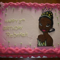 Isn't She Beautiful! Sheet decorated with the beautiful Princess Tiana, she is a FBCT with fondant daisies, air brushed edges and sugar balls to round out the...