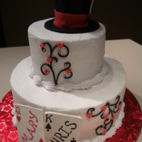 Alice In Wonderland Wedding Shower Cake buttercream cake with fondant covered rice krispie mad hatter top hat and gumpaste playing cards written on with edible markers