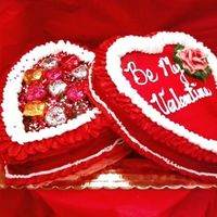 Romantic Heart Candy Box This two heart cakes, one yellow and one is chocolate. The icing is all buttercream except for where the candy sits. That is dark chocolate...