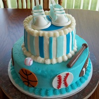 Sports Themed Baby Shower Cake 10 inch and 6 inch cakes with buttercream frosting and fondant/gumpaste accents shoes were made using pattern from here on CC. Made of...