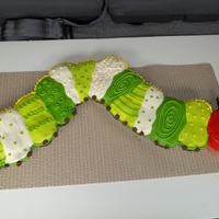 The Hungry Little Caterpillar Copied this from an awesome cake site called "My Cake School .com" Very fun to make body is cupcakes and head is 4 inch cake