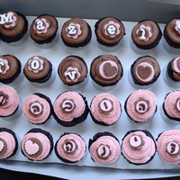 Baby Girl Cupcakes RI Transfer letters, fondant flowers, buttercream swirls