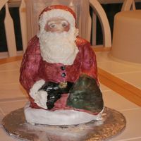 Santa This is a pan that I bought at Williams-Sonoma after Christmas last year. I was playing with fondant when I did this cake. I have never...