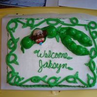 Monkey In A Pod mmf figures on buttercream iced cake