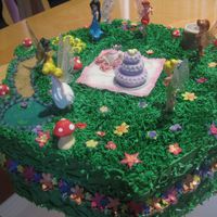 Pixie Hollow The home of Tinkerbell and friends. They're plastic but everything else is edible made with white chocolate sugarpaste and petal paste...