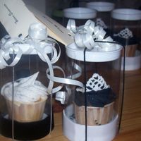 Wedding Favours And Place Cards These are the finished cupcakes that my sister had as favours for her wedding they are fruit cupcakes with royal icing swirl and tirara and...