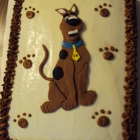 Scooby Doo Double chocolate fudge 1/2 sheet cake with cream cheese filling; frosted with cream cheese; fondant Scooby...thanks for looking!