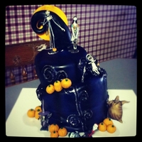 Nightmare Before Christmas My son helped airbrush this cake for his girlfriend;...it's a red velvet cake with cream cheese filling; handmade peanut butter...