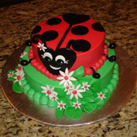 Ladybug Buttercream with fondant accessories.