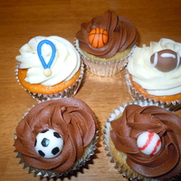 Sports Cupcakes Orange dreamsicle cupcakes with IMBC and Smores cupcakes - graham cracker cupcake, marshmallow filling, chocolate buttercream. Each topped...
