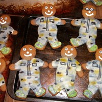 Military Gingerbread Men marshmallow fondant and royal icing. I made these in honor of my son graduationg Basic Training for the Air Force. I'm going to donate...