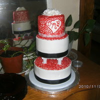 Son's Very Quicky Wedding Cake All Buttercream with royal icing roses and fabric ribbon.