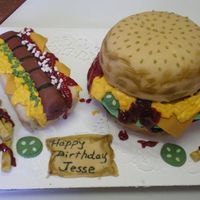 Hotdog_And_Hamburger_Cake.jpg Made this for my grandson whose party was in a pizza place and the looks we got when we walked in was neat because they thought they were...