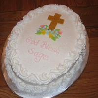 Baptism Cake Oval cake, buttercream icing, gumpaste flowers