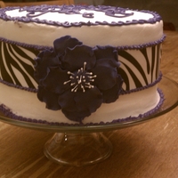 Zebra Cake My daughter's birthday cake. Red Velvet with cream cheese buttercream and raspberry filling. Wilton zebra sugar sheet. Purple fantasy...