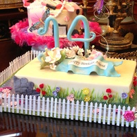 Garden Cake This is a white cake with cream cheese icing. I incorporated painting on the icing with food coloring and gumpaste flowers.