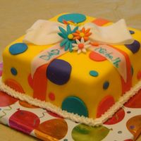 Giftbox Cake This is my very first fondant and buttercream cake. It is a 8" square white cake filled with strawberry filling and iced in MMF and...