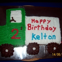 Truck Birthday Cake Chocolate cake iced with butter cream. Cake carved in the shape of a truck for childs birthday.