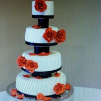 Nephew's Wedding Cake White cake with gumpaste red roses