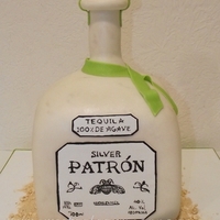 Silver Patron Bottle Cake Silver Patron Bottle Cake with hand-painted label and fondant lime.