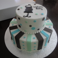 Baby Shower 2-tier baby shower cake with fondant stripes and buttercream piping.